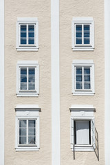 Fototapeta na wymiar Colorful windows of the building in Salzburg.