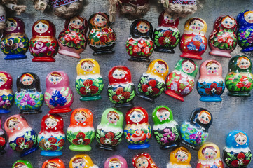 Fototapeta na wymiar Colorful Russian nesting dolls at the market.