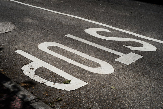 Stop inscription on road