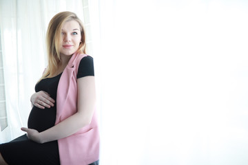 Pregnant young beautiful girl on the ninth month 