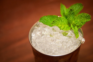 Ice bucket on wooden table