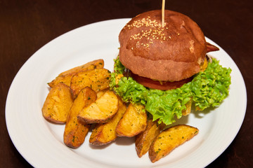 Burger with wedges potatoes