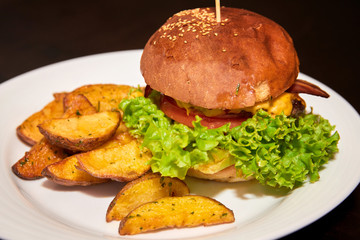 Burger with wedges potatoes