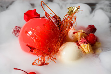 Cake, raspberries and dry ice