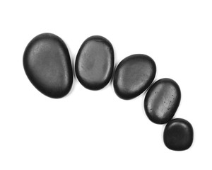Pile black rocks isolated on white background, top view