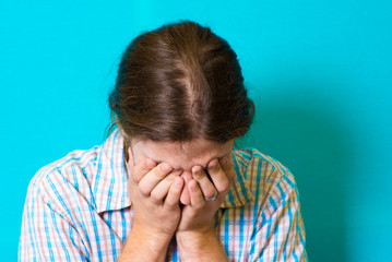 Fototapeta premium the young man is upset and crying