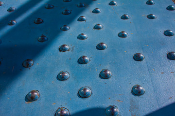 part of the bridge structure with rivets