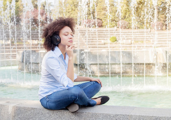 Beautiful Happy Afro American Young Woman Listening Music