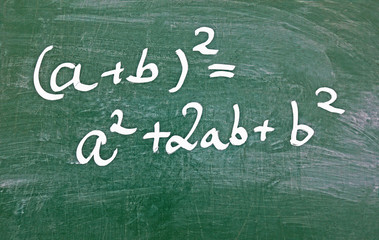 first binomial formular, written on green chalkboard