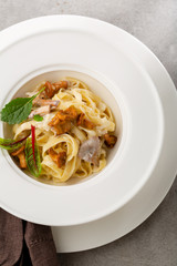 Italian pasta with chanterelles sauce