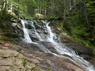 wild waterfall in the landscape of the bavarian forest