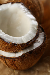 Fresh coconut fruits halves close-up