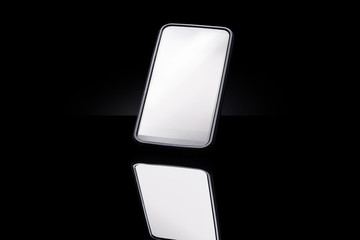 Smartphone isolated on black background.