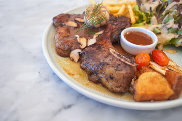 T-Bone steak with fresh vegetable salad