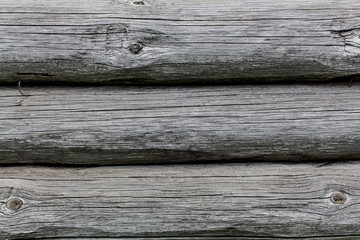 Wooden texture of round logs gray grunge texture