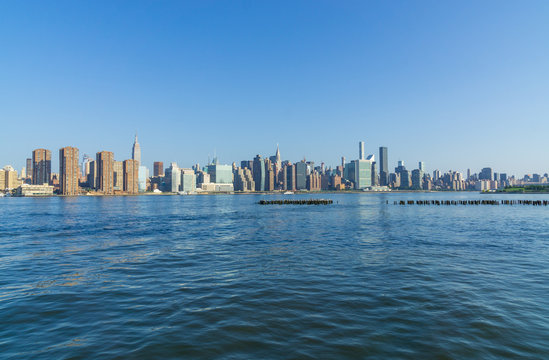 Manhattan Midtown skyline panorama in a sunny day. New York