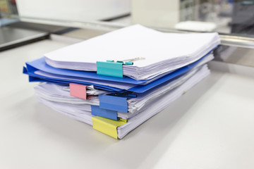 file folder and Stack of business report paper file on the table in a work office, concept document...