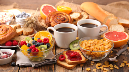 Fototapeta na wymiar table with full healthy breakfast