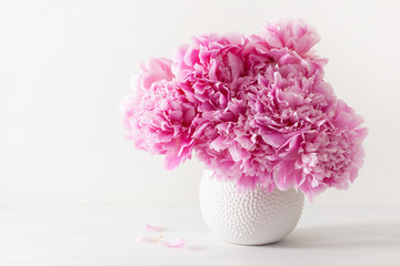 beautiful pink peony flowers bouquet in vase © Olga Miltsova
