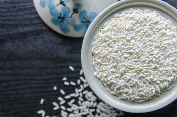 Background and wallpaper by pile of paddy rice and rice seed.