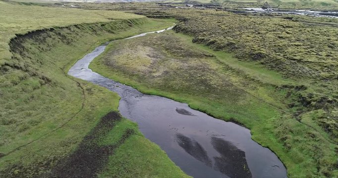 4k 60 fps Iceland Aerial view of Landmanalaugar river, fly over moss field