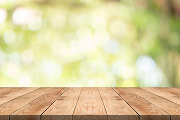 Empty wood table on blurred background copy space for montage your product or design,Blank brown...