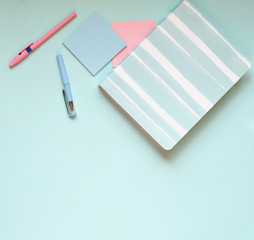 The stationery on a blue background.