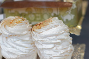 Rich variety of spanish cookies in showcase of typical pastry shop in the street of Barcelona 