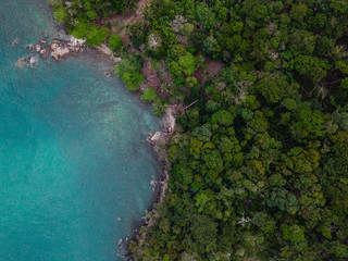 Tropical island from aerial view. Blue water seashore. Indian ocean. Paradise island. Koh Chang, Thailand