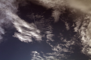 clouds in the sky,jet,travel,cloudscape,weather,airplane,blue,air