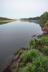 Fototapeta na wymiar Oka river in the morning and fishing rods