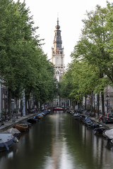 A view along an Amsterdam canal, towards the Zuiderkerk church, built in 1611 & once painted by Monet.