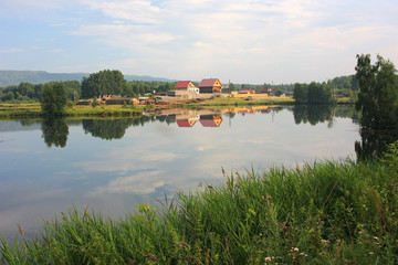 Fototapeta na wymiar The village by the lake
