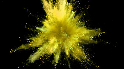 Explosion of coloured powder on black background.