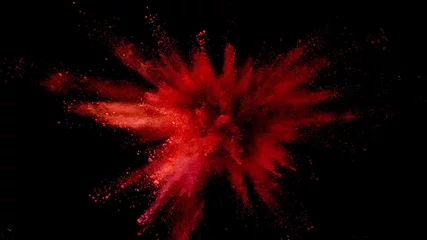 Explosion von farbigem Pulver auf schwarzem Hintergrund. © Jag_cz