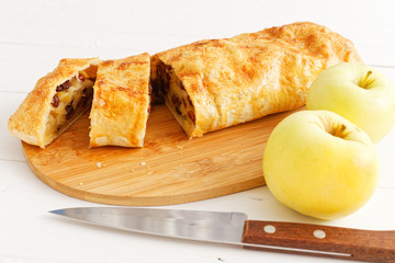 Homemade pastry - strudel with apples and raisins