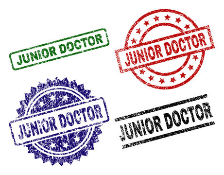 JUNIOR DOCTOR seal imprints with corroded surface. Black, green,red,blue vector rubber prints of JUNIOR DOCTOR caption with dust surface. Rubber seals with round, rectangle, rosette shapes.