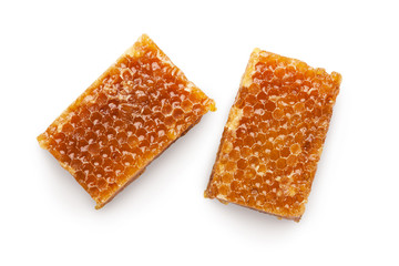 Tasty sweet cut honeycombs isolated on white