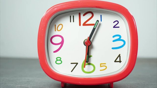 Clock red&nbsp;rotates&nbsp;in on white background moving  Full HD 1920x1080.