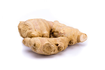 Piece of ginger isolated on a white background