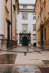 Fototapeta na wymiar Beautiful streets after the rain of a European city with old architecture