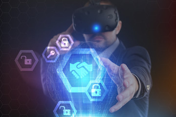 The concept of business, technology, the Internet and the network. A young entrepreneur working on a virtual screen of the future and sees the inscription: