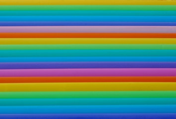 Rainbow made from colorful cocktail tubes 