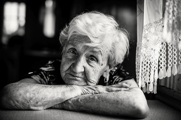 Elderly woman portrait of black and white close-up.