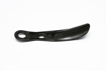 Black Plastic Shoehorn Isolated on a White Background