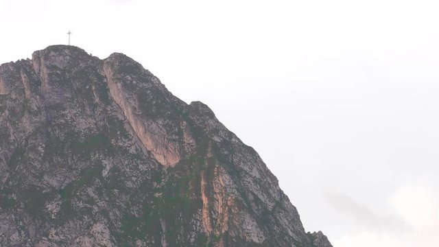 Poland,Zakopane, View of the highlander hut. In the background of mountains TATRY, Clouds. Trees and meadows. Sleeping knight and cross at Giewont. Sunrise. Panning camera, Pan, Closeup
