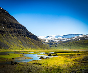 Fototapeta na wymiar Icelandic landscape with snow mountains
