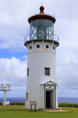 Fototapeta na wymiar Lighthouse perched above the ocean