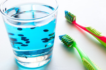 toothbrushes and rinse aid close-up