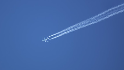 typical airplane in the blue sky